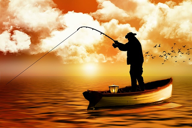 rybář na člunu